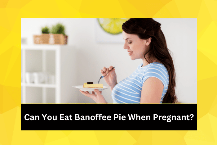 Happy pregnant woman eating cake at home kitchen