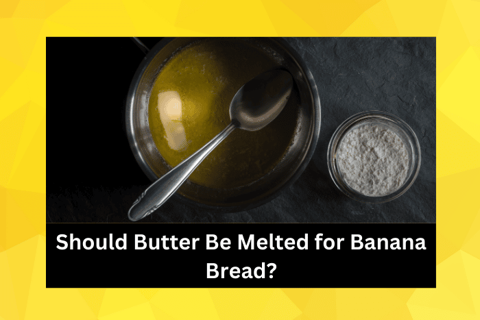 Melted butter in a ladle and a bowl of flour