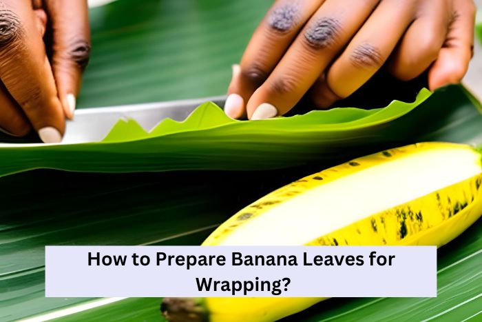 A pair of hands preparing banana leaves